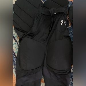Youth medium UA football pants